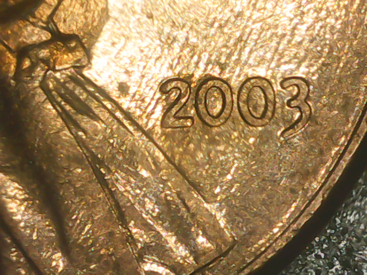 2003-Lincoln-Cent-With-A-Cancerous-Jaw